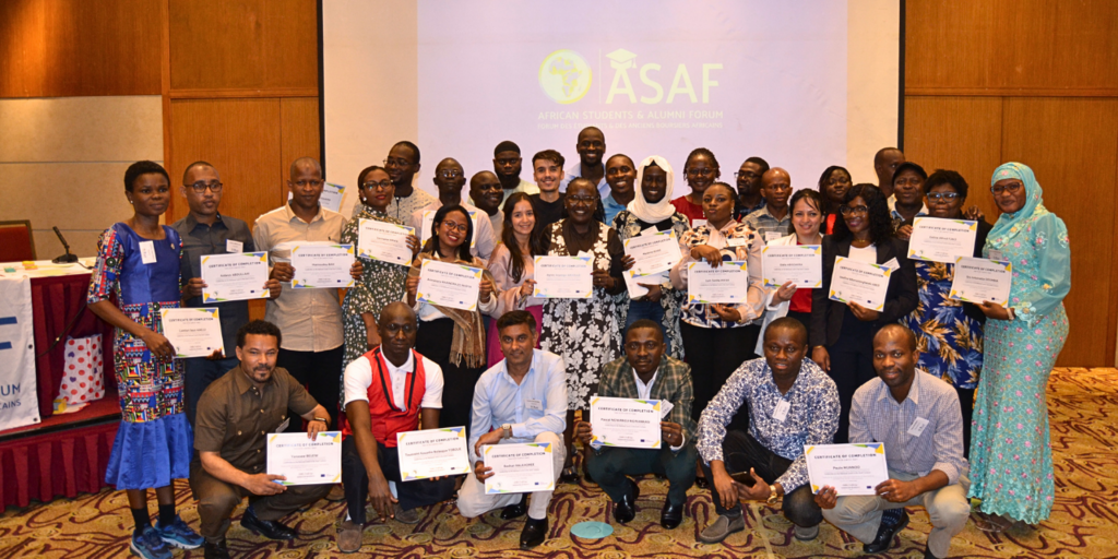 ASAF Co-ambassadors in a group photo holding their certificates after the completion of a training event. 